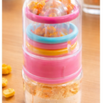 baby feeding bottle with silicone teether rings & storage cap