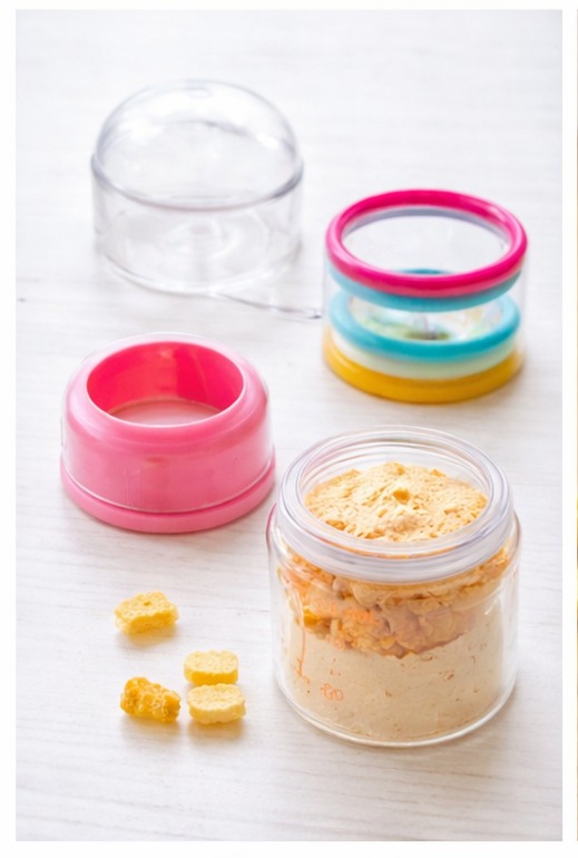 baby feeding bottle with silicone teether rings & storage cap